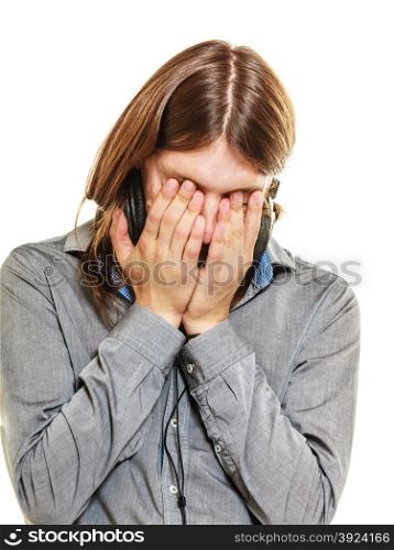 Desperate man crying in hands.. Desperate sad man crying in his hands. Young stressed frustrated guy isolated on white background.