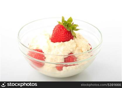 Dessert with strawberry and curd isolated on white