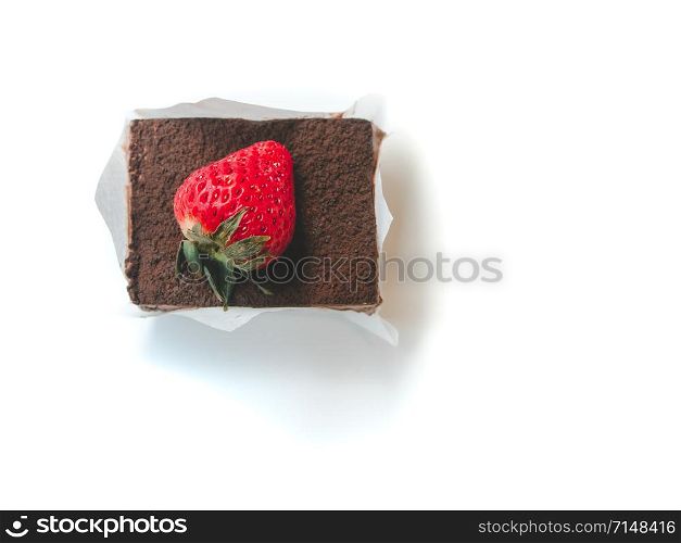 Desserts and snacks concept from Strawberry Shortcake or Chocolate cake topping with fresh strawberry. Top view, White background