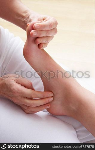 Detail foot reflexology massage