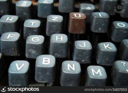 detail of a black vintage typewriter close up on keys
