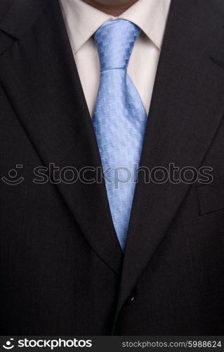 detail of a Business man Suit with blue tie