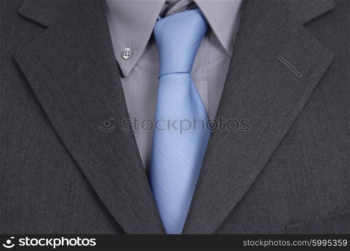 detail of a Business man Suit with blue tie