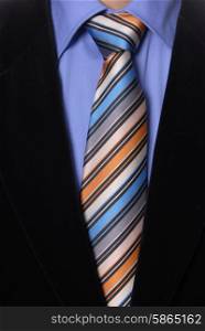 detail of a Business man Suit with colored tie
