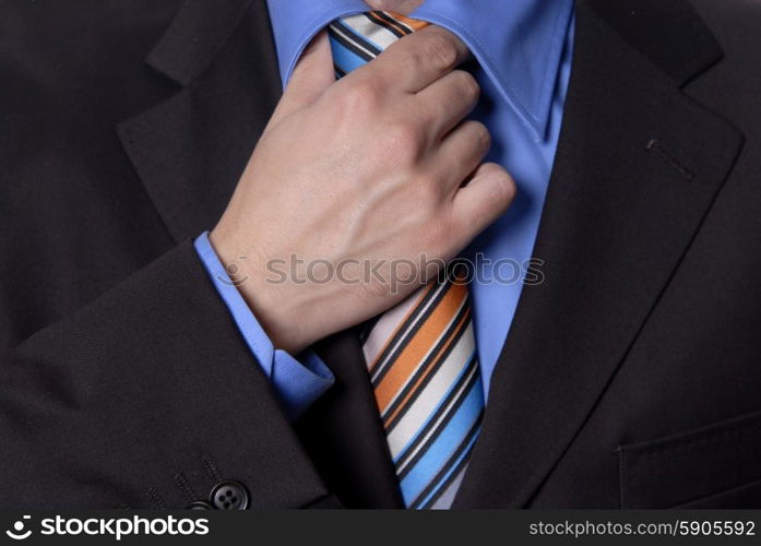 detail of a Business man Suit with colored tie