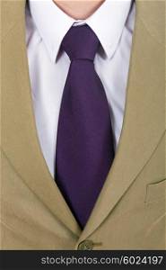 detail of a Business man Suit with purple tie