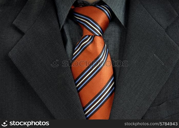 detail of a Business man Suit with red tie