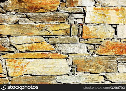 Detail of a colorful stone wall