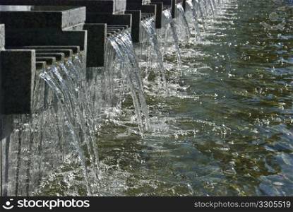 detail of a modern fountain in the city center of Berlin