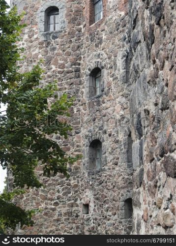Detail of a stone wall of the fortress protection. fragment of old city stone wall