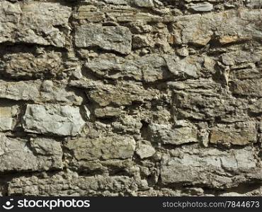 Detail of a wall relief ancient fortification with large boulders