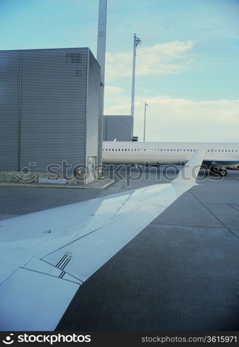 Detail of airplane wing in airport
