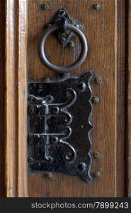 Detail of an antique doorknocker in the church in Delft, Netherlands