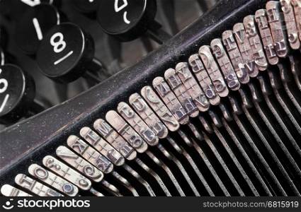 Detail of an old typewriter, machine of the 30s
