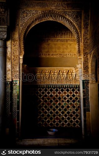 Detail of ancient door in Alhambra UNESCO site - Spain, decorations 800 years old
