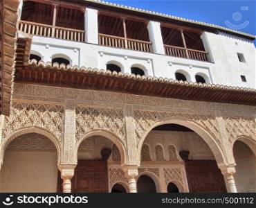 Detail of arabic carvings in the Alhambra of Granada, Andalusia, Spain