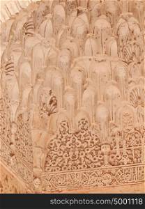 Detail of arabic carvings of Patio de la Acequia in the Alhambra of Granada in Andalusia, Spain