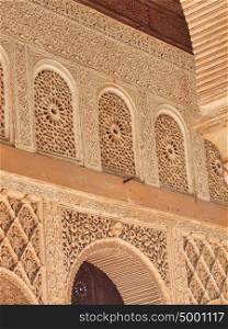 Detail of arabic carvings of Patio de la Acequiain the Alhambra of Granada in Andalusia, Spain