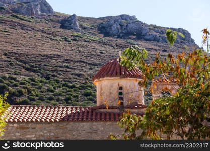 Detail of architecture stone church in Vathia old town, Mani Peloponnese Greece. Architectural theme.. Detail of architecture church in Vathia town, Mani Greece.