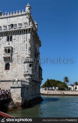 Detail of Belem Tower on the Tagus River in Lisbon, Portugal against Blue Sky