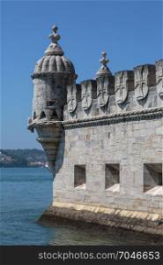 Detail of Belem Tower on the Tagus River in Lisbon, Portugal against Blue Sky