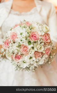 detail of bridal bouquet pink and white roses