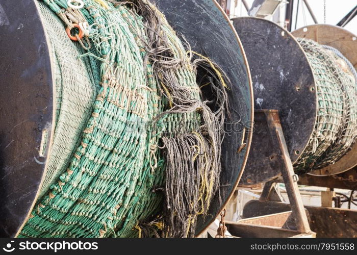 Detail of commercial fishing boat equipment at the dock.