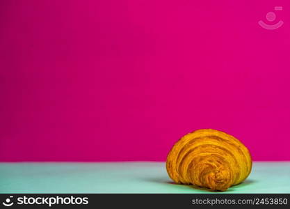 Detail of fresh croissant isolated, french breakfast concept.