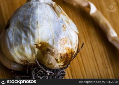 Detail of garlic on wooden table