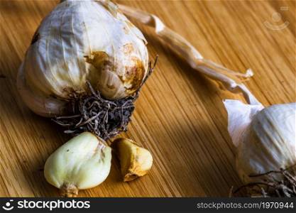 Detail of garlic on wooden table