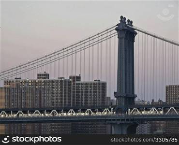 detail of Manhattan Bridge with condos in the background
