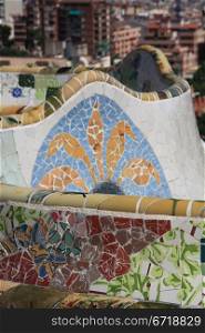 Detail of mosaic in Guell park in Barcelona, part of sea serpent bench
