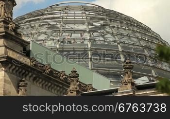 Detail of Norman Foster&acute;s cupola with visitors walking inside