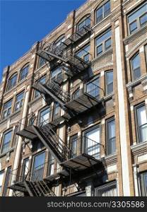 detail of old houses with a metal staircase in Boston