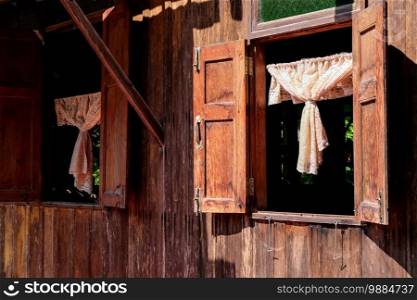 Detail of Old wooden window ,Thailand traditional style house 
