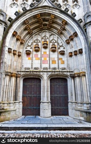 Detail of Portal of the Gothic Church St.Hubert in Belgium
