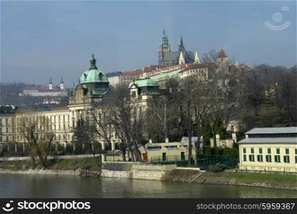 detail of prague river and architecture