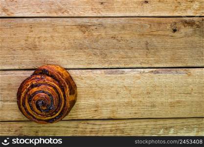 Detail of puff pastry on wooden table. Food and breakfast concept. Top view and copy space. Detail of puff pastry on wooden table. Food and breakfast concept. Top view and copy space