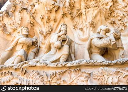 Detail of Sagrada Familia- beautiful sculptures on facade in Barcelona, Spain. Roman Catholic church designed by architect Antoni Gaudi.