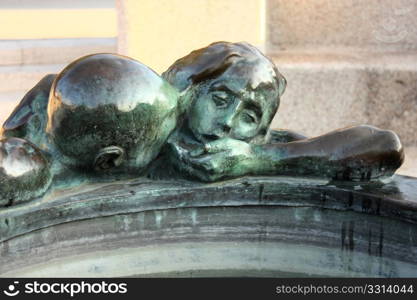 Detail of sculpture well of life in front of Croatian National Theater in Zagreb