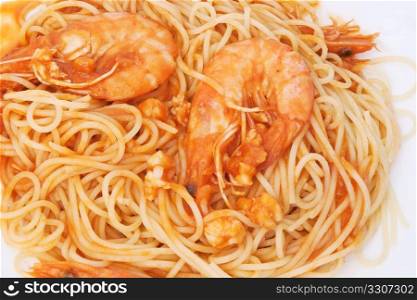 detail of spaghetti with shrimps and tomato sauce