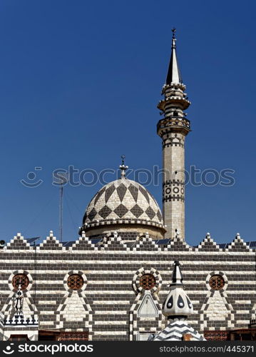 Detail of the black and white Abu Darwish Mosque in Amman, Jordan