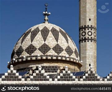 Detail of the black and white Abu Darwish Mosque in Amman, Jordan