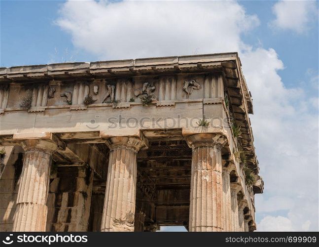 Detail of the columns and carving on Temple of Hephaestus in Greek Agora Athens. Detail of the Temple of Hephaestus in Greek Agora