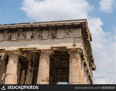 Detail of the columns and carving on Temple of Hephaestus in Greek Agora Athens. Detail of the Temple of Hephaestus in Greek Agora