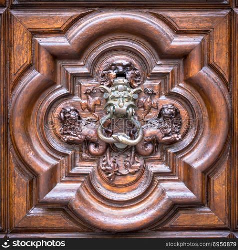 Detail of the Devil Door in Turin, Italy. Located in Via Vittorio Alfieri, dated around 1850. The legend says that this door was not there the evening before and it appears mysteriously the morning after.