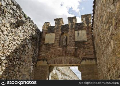 Detail of the gate to the roman aqueduct in Segovia, Spain