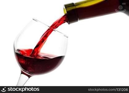 Detail of the glass is filled with red wine isolated on white background. Detail of the glass is filled with red wine