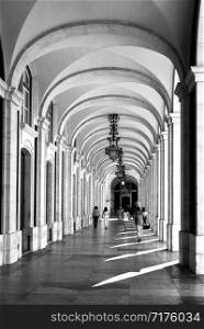 Detail of the magnificent arcade surrounding the Commerce Square in Lisbon, Portugal