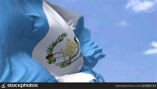 Detail of the national flag of Guatemala waving in the wind on a clear day. Guatemala is a country in Central America. Selective focus.